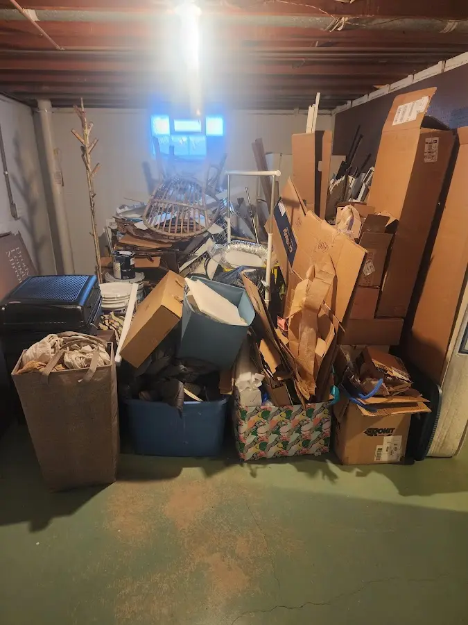 Roll-off dumpster container at job site for 15 Yard Dumpster Rental in Brownstown